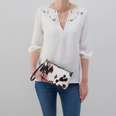 DARCY CROSSBODY COW PRINT